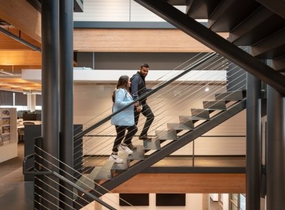 Meghan Davis walking up the stairs in Dallas