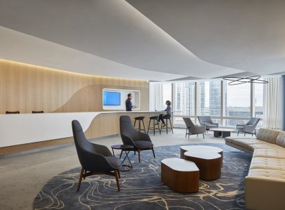 People having a conversation at an elegant front desk