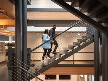 Meghan Davis walking up the stairs in Dallas