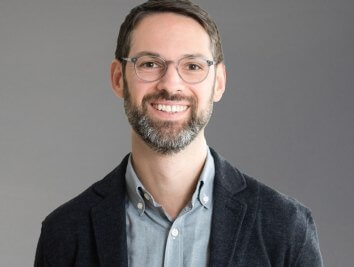 Mike Aziz Headshot Corgan