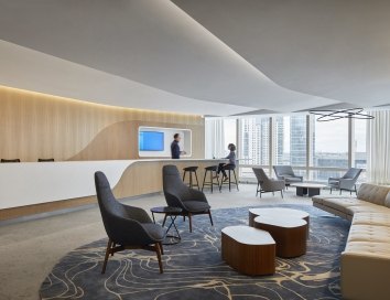 People having a conversation at an elegant front desk
