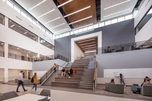 Photograph showing 3 stories of Panther Creek High School