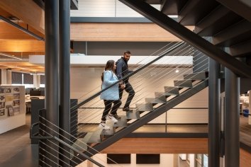 Meghan Davis walking up the stairs in Dallas