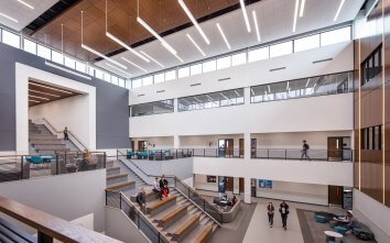Photograph showing 3 stories of Panther Creek High School