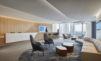 People having a conversation at an elegant front desk
