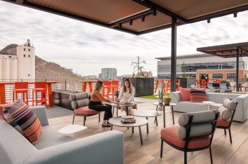 Employees enjoying the 100 Mill Rooftop