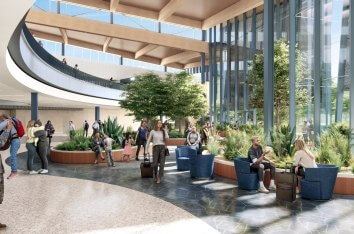 airport terminal with seating and green space