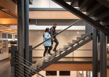 Meghan Davis walking up the stairs in Dallas